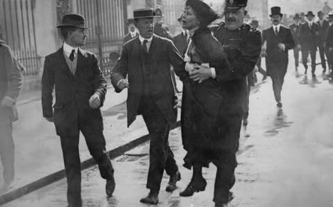 Emmeline Pankhurst arrested   - Credit: Jimmy Sime/Central Press/Hulton Archive/Getty