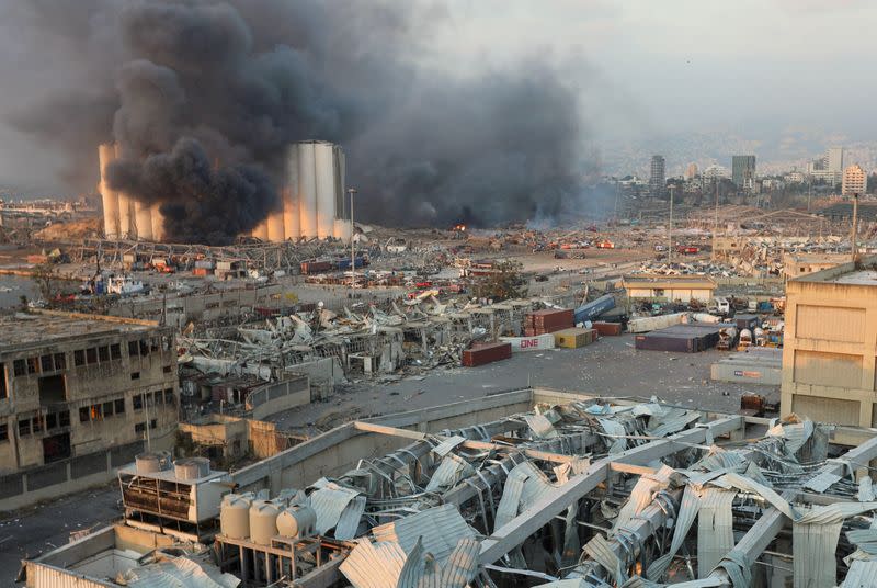 FILE PHOTO: Smoke rises from the site of an explosion in Beirut