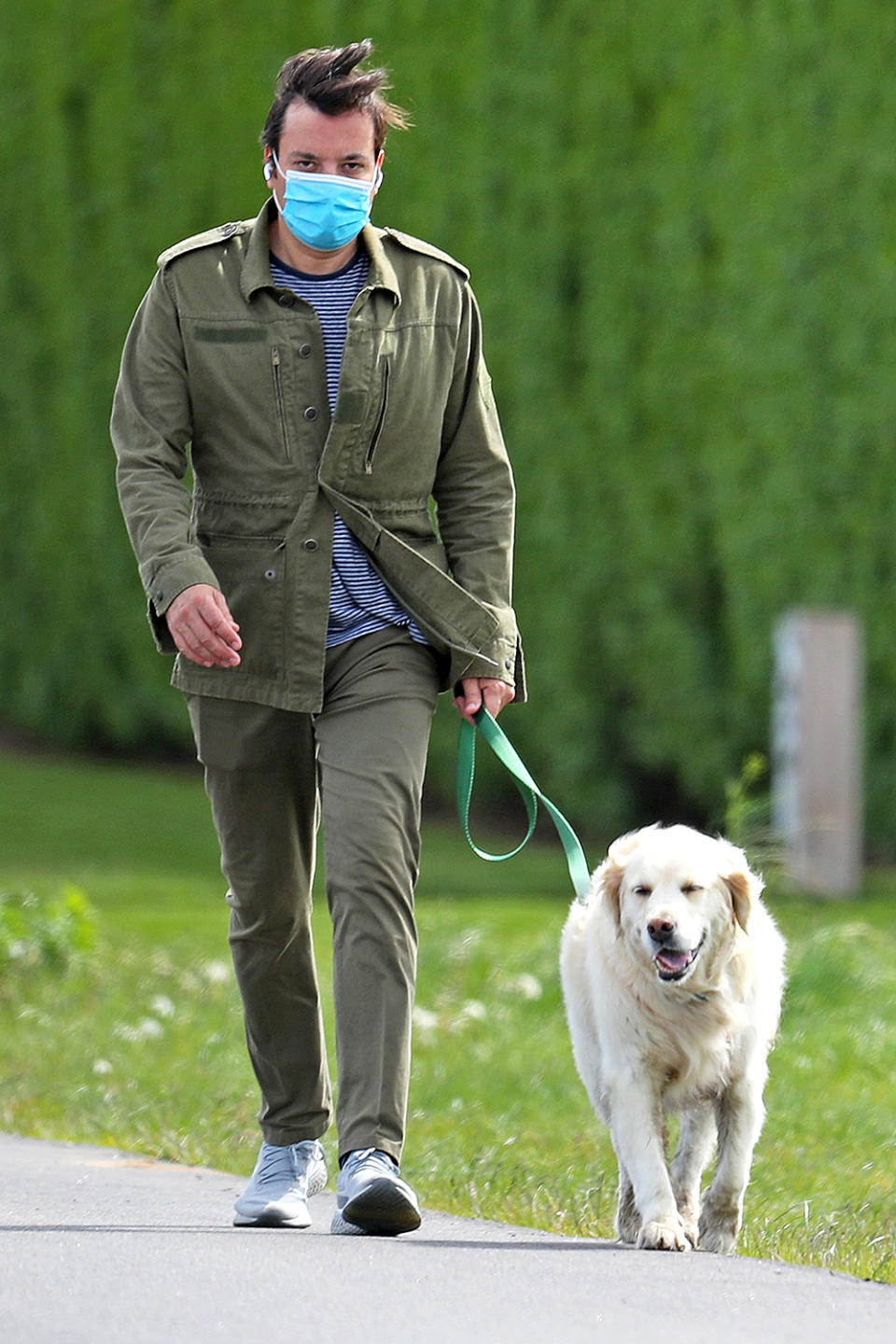 <p>Jimmy Fallon steps out in an army green ensemble to walk his dog on Friday ahead of Memorial Day Weekend in The Hamptons. </p>