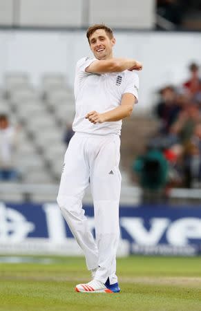 Britain Cricket - England v Pakistan - Second Test - Emirates Old Trafford - 25/7/16 England's Chris Woakes celebrates taking the wicket of Pakistan's Mohammad Amir Action Images via Reuters / Jason Cairnduff Livepic