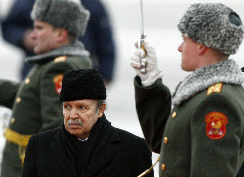 FILE - In this Monday, Feb. 18, 2008, file photo Algeria's President Abdelaziz Bouteflika attends an official welcome ceremony on his arrival to Moscow. Former Algerian President Bouteflika, who fought for independence from France in the 1950s and 1960s and was ousted amid pro-democracy protests in 2019 after 20 years in power, has died at age 84, state television announced Friday, Sept. 17, 2021. (AP Photo/Mikhail Metzel, File)