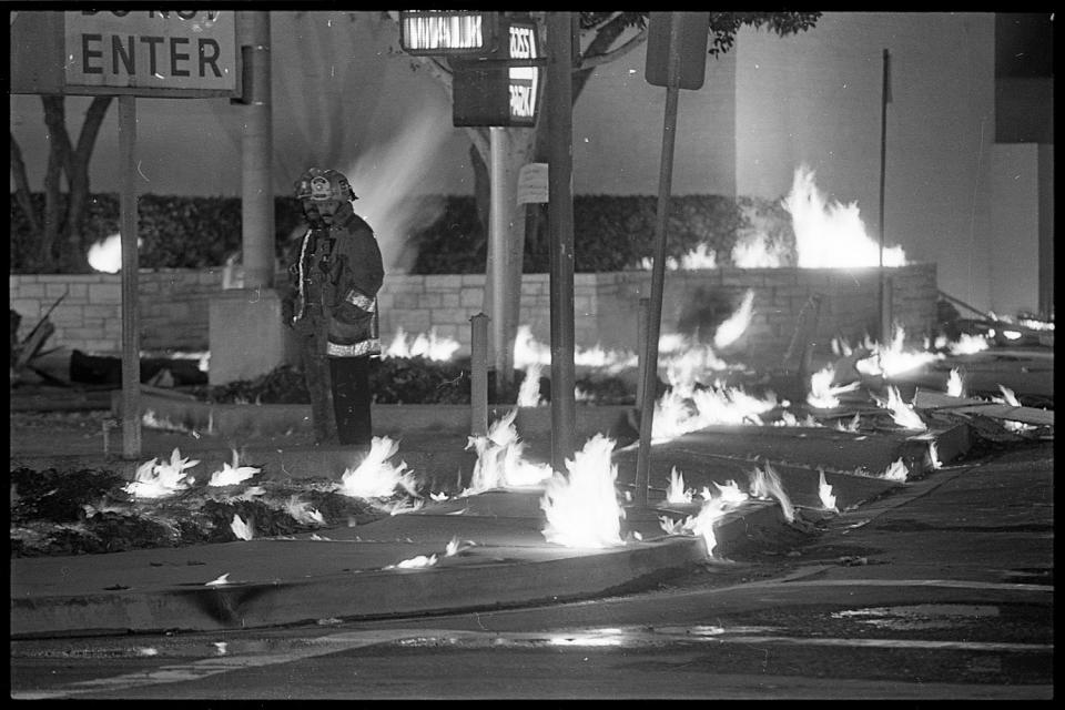 Firefighters at the scene of a 1985 methane explosion in the Fairfax district