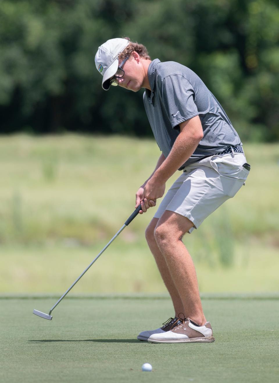 Jack Wallace, of Cantonment, has his putt go in and out of the hole during the Divot Derby at Tiger Point Golf Club in Gulf Breeze on Wednesday, July 20, 2022.