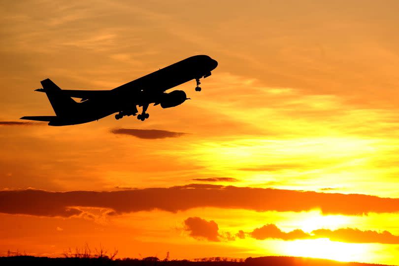 A plane takes off from a UK airport. Owen Humphreys/PA Wire