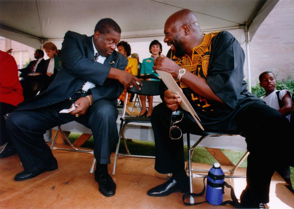 B.B. King and Isaac Hayes visit on the podium on Sept. 8, 1995, in front of Manassas High School where a historical marker was unveiled honoring the entertainment achievements of Hayes, a 1962 Manassas High graduate.