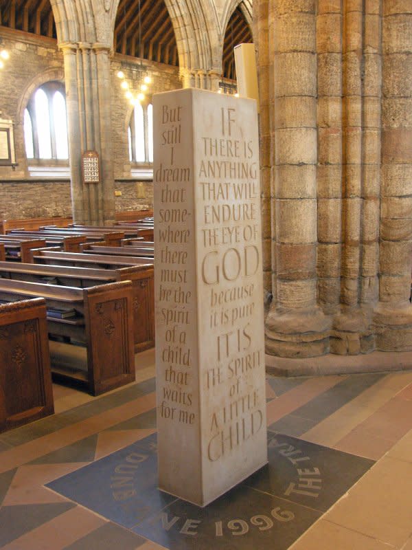 A standing stone in Dunblane Cathedral sculpted by Richard Kindersley commemorates the Dunblane, Scotland, school massacre, which killed 16 students and one teacher on March 13, 1996. File Photo by PaddyBriggs/Wikimedia