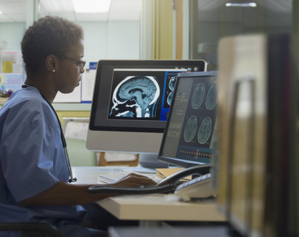 Doctor examining x-rays in hospital