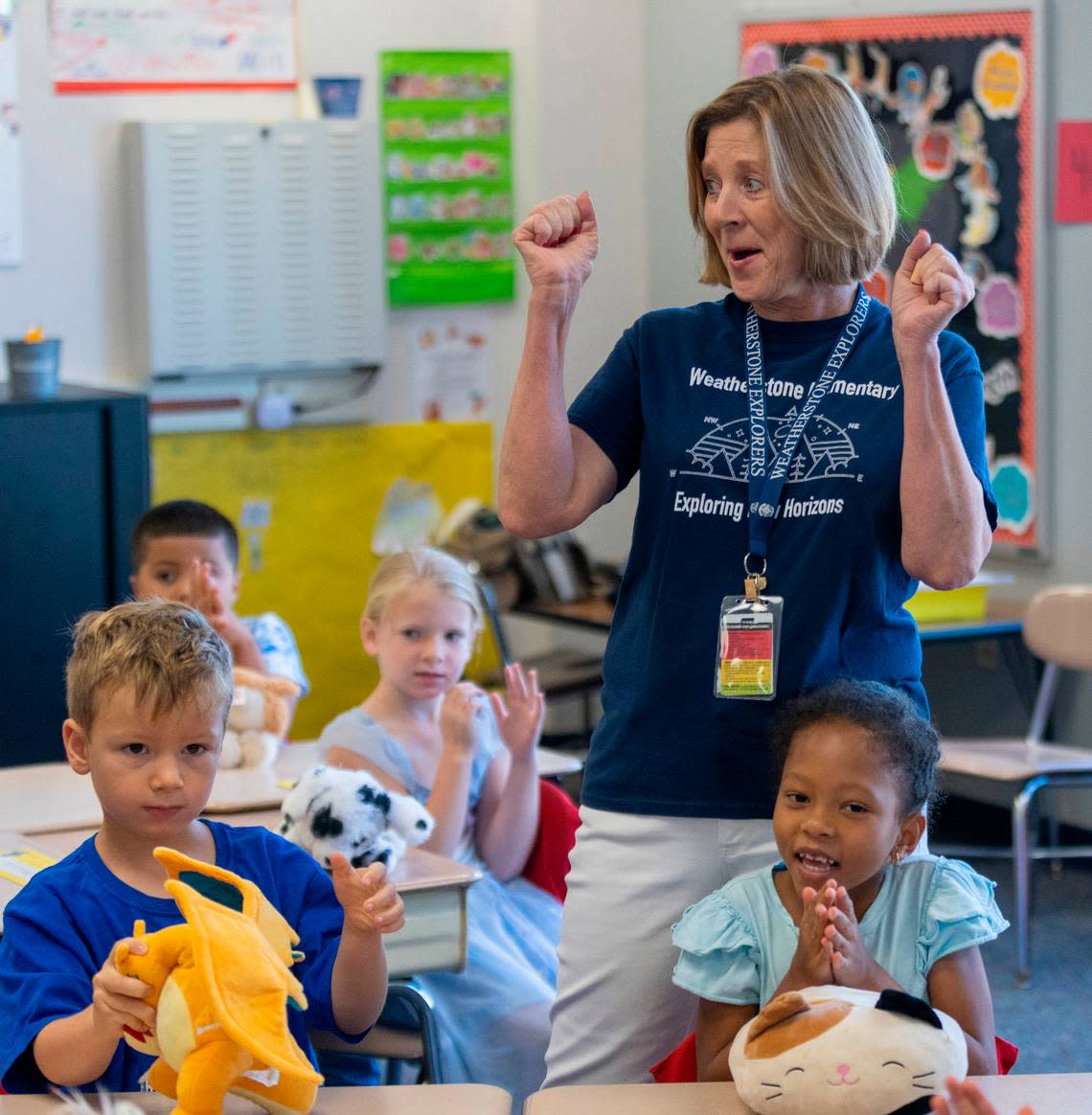 Weatherstone Elementary School first grade teacher Jennifer Ivarsson and her students react to the news that Weatherstone has been chosen as a National Blue Ribbon School by the U.S. Department of Education on Friday, September 16, 2022 in Cary, N.C