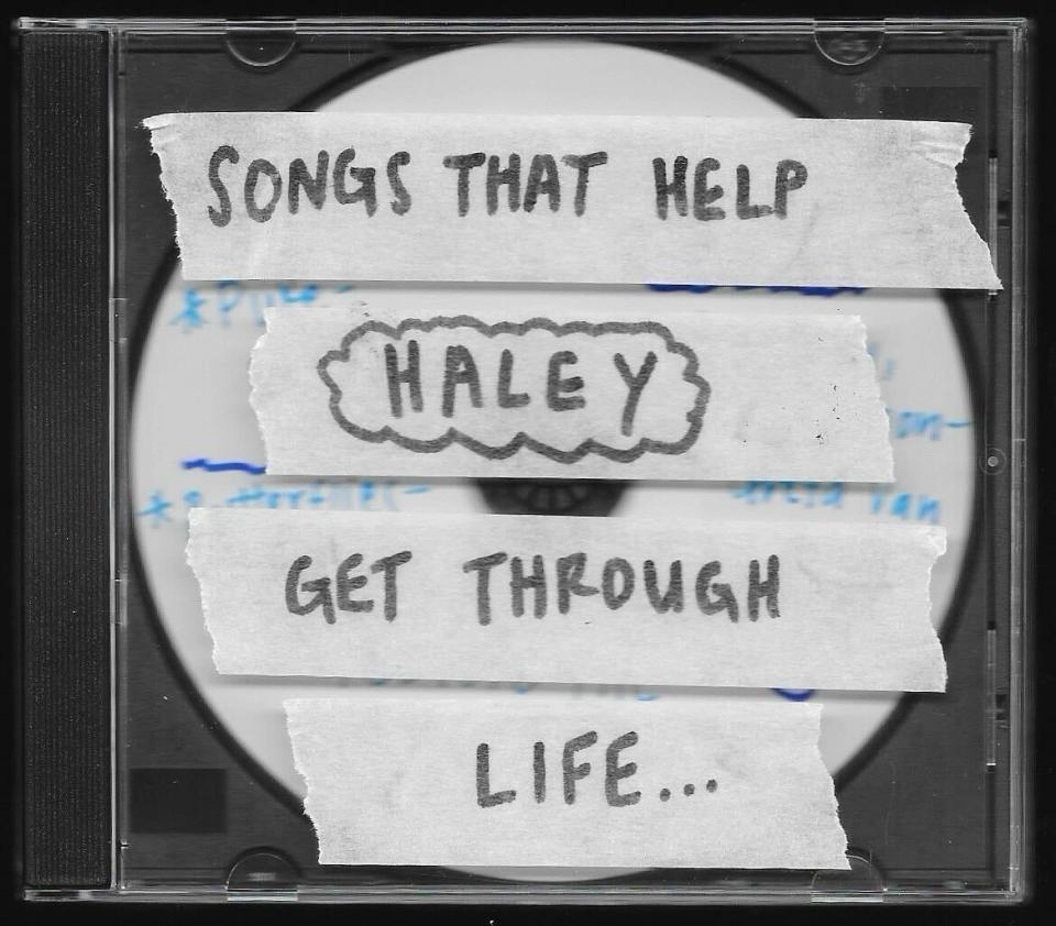 Image of a CD case with handwritten notes: "SONGS THAT HELP HALEY GET THROUGH LIFE..."