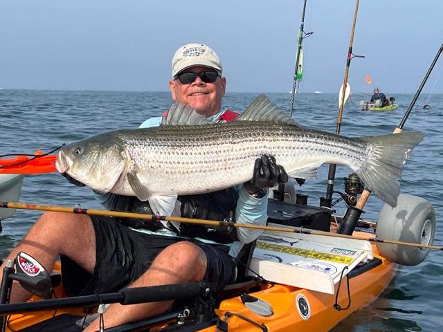 Tom Houde caught a 46-inch bass from his kayak off Newport.