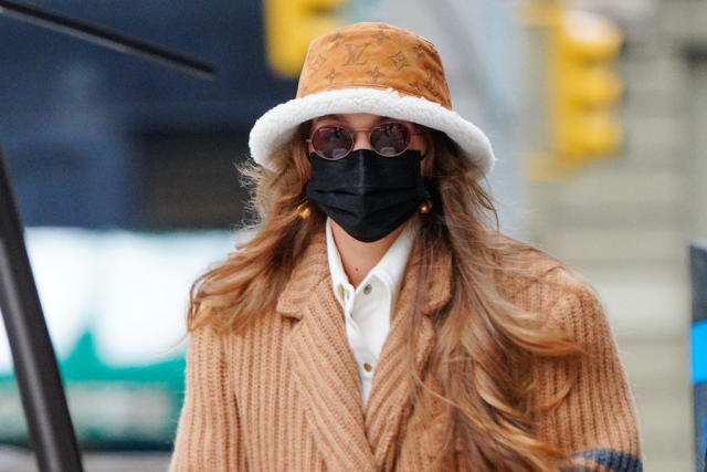 Gigi Hadid Is the Chicest New Mom In a Louis Vuitton Bucket Hat and This  Must-Have Boot For 2021