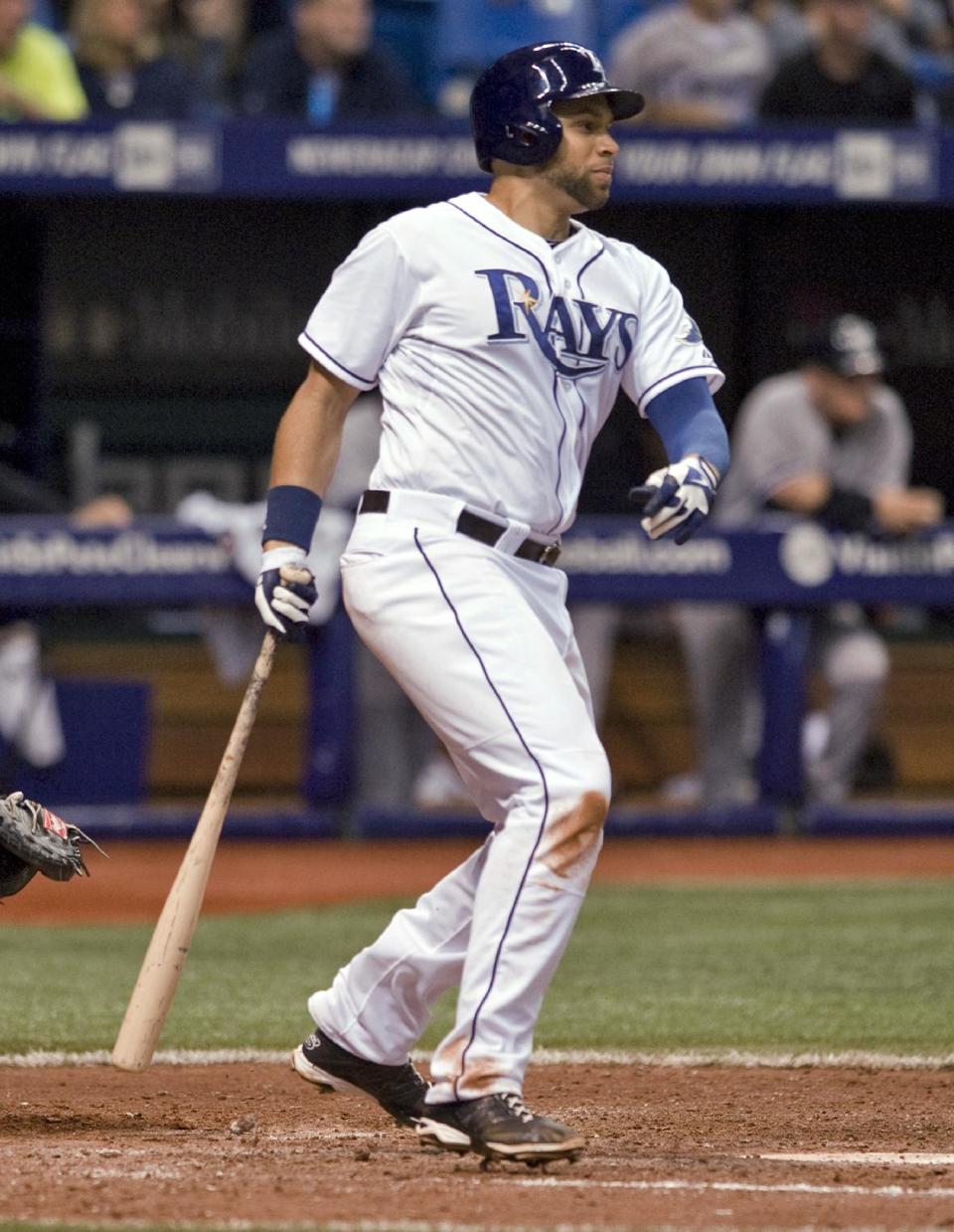 Tampa Bay Rays' James Loney watches a two-run single off New York Yankees reliever David Phelps during the seventh inning of a baseball game Friday, April 18, 2014, in St. Petersburg, Fla. (AP Photo/Steve Nesius)