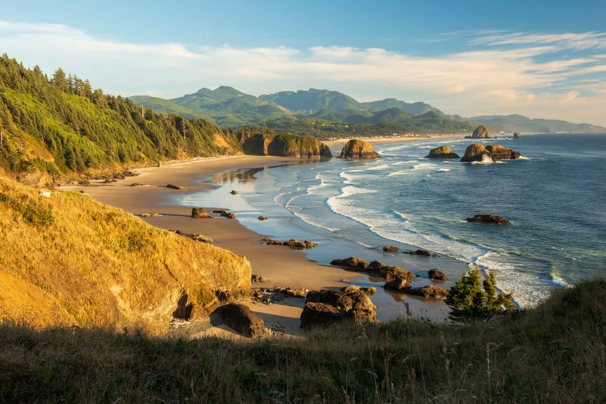 You can visit Cannon Beach whatever the weather (Getty Images/iStockphoto)