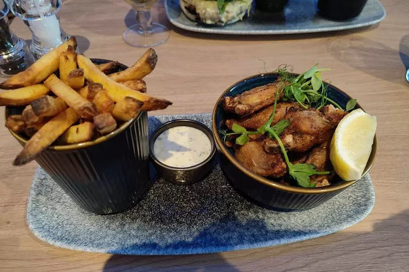 The fried chicken wings and chips were a letdown -Credit:WalesOnline