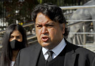 Faisal Siddiqi, a lawyer for the family of Daniel Pearl, an American reporter for the Wall Street Journal who was kidnapped and killed in Pakistan, talks to journalists after an appeal hearing in the case, at the Supreme Court, in Islamabad, Pakistan, Wednesday, Jan. 27, 2021. In a dramatic turn of events, Ahmad Saeed Omar Sheik, a man convicted and later acquitted in the 2002 murder of American journalist Daniel Pearl admitted a "minor" role in his death, upending 18 years of denials, the Pearl family lawyer said Wednesday. (AP Photo/Waseem Khan)