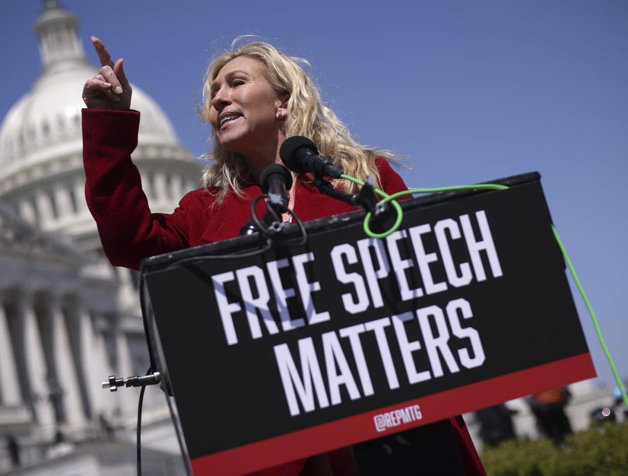 <span class="caption">Republican Rep. Marjorie Taylor Greene of Georgia speaks outside the U.S. Capitol on April 28, 2022. </span> <span class="attribution"><a class="link " href="https://www.gettyimages.com/detail/news-photo/rep-marjorie-taylor-greene-speaks-during-a-press-conference-news-photo/1394252510?adppopup=true" rel="nofollow noopener" target="_blank" data-ylk="slk:Win McNamee/Getty Images;elm:context_link;itc:0">Win McNamee/Getty Images</a></span>
