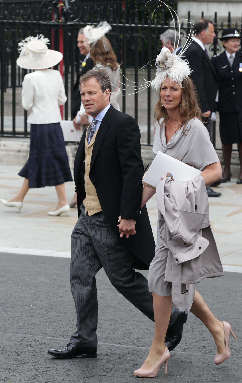 LONDON, ENGLAND - APRIL 29:  Tom Bradby from ITV News with his wife Claudia exit following the marriage of Prince William, Duke of Cambridge and Catherine, Duchess of Cambridge at Westminster Abbey on April 29, 2011 in London, England. The marriage of the second in line to the British throne was led by the Archbishop of Canterbury and was attended by 1900 guests, including foreign Royal family members and heads of state. Thousands of well-wishers from around the world have also flocked to London to witness the spectacle and pageantry of the Royal Wedding.  (Photo by Chris Jackson/Getty Images)