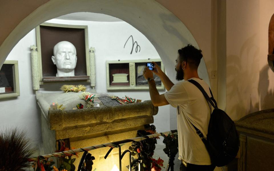 Fascist sympathisers make regular pilgrimages to see Mussolini's tomb in the town of Predappio - Chris Warde-Jones