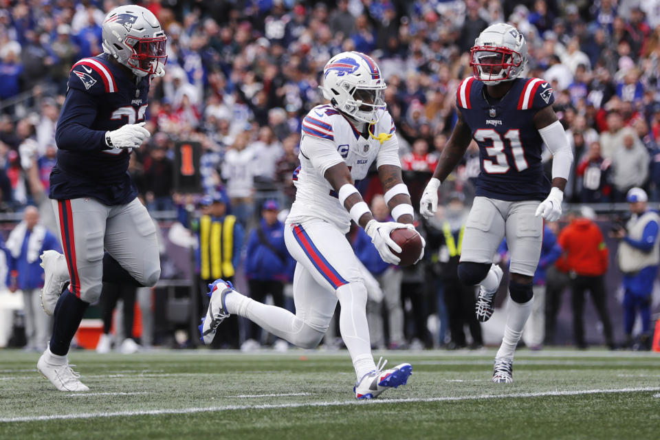 Buffalo Bills wide receiver Stefon Diggs (14) scores against the New England Patriots during the second half of an NFL football game, Sunday, Oct. 22, 2023, in Foxborough, Mass. (AP Photo/Michael Dwyer)