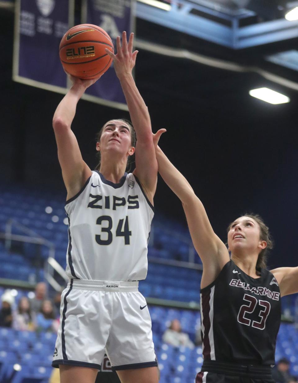 University of Akron's Reagan Bass puts up a shot as Bellarmine's Hayley Harrison defends on Thursday in Akron.