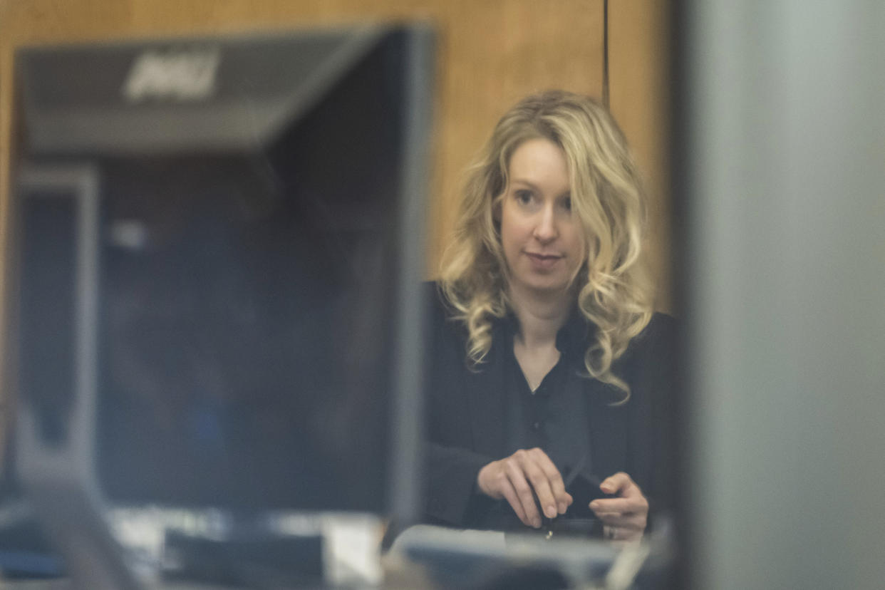 Theranos founder and CEO Elizabeth Holmes arrives to federal court in San Jose, Calif., Friday, Nov. 18, 2022. A federal judge will decide whether Holmes should serve a lengthy prison sentence for duping investors and endangering patients while peddling a bogus blood-testing technology. (AP Photo/Nic Coury)