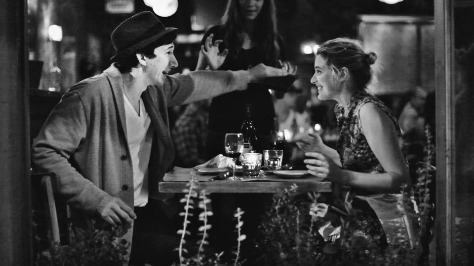 This undated publicity photo released by the Independent Film Channel shows Greta Gerwig, right, as Frances, with Adam Driver as Lev having dinner in a scene from the film, "Frances Ha." (AP Photo/IFC)