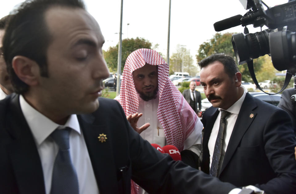 Saudi Arabia's top prosecutor Saud al-Mojeb walks to board a plane to leave Turkey, in Istanbul, Wednesday, Oct, 31, 2018. A top Turkish prosecutor said Wednesday that Saudi journalist Jamal Khashoggi was strangled as soon as he entered the Saudi Consulate in Istanbul as part of a premeditated killing, and that his body was dismembered before being disposed of. A statement from chief Istanbul prosecutor Irfan Fidan's office also said that discussions with Saudi chief prosecutor Saud al-Mojeb have yielded no "concrete results" despite "good-willed efforts" by Turkey to uncover the truth.(DHA via AP)