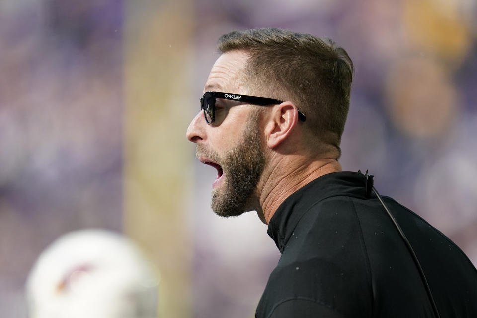 Arizona Cardinals head coach Kliff Kingsbury directs his team during the first half of an NFL football game against the Minnesota Vikings, Sunday, Oct. 30, 2022, in Minneapolis. (AP Photo/Abbie Parr)