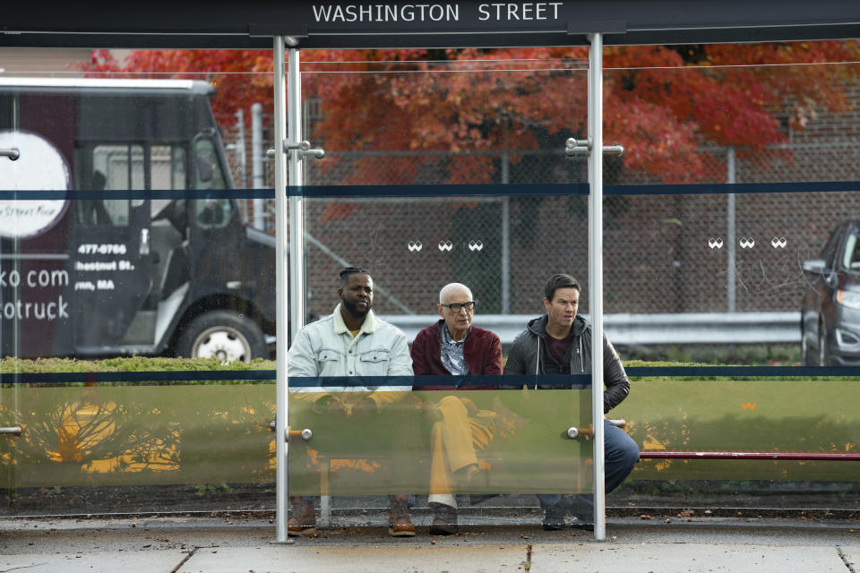 This image released by Netflix shows Winston Duke, from left, Alan Arkin and Mark Wahlberg in a scene from "Spenser Confidential." (Daniel McFadden/Netflix via AP)