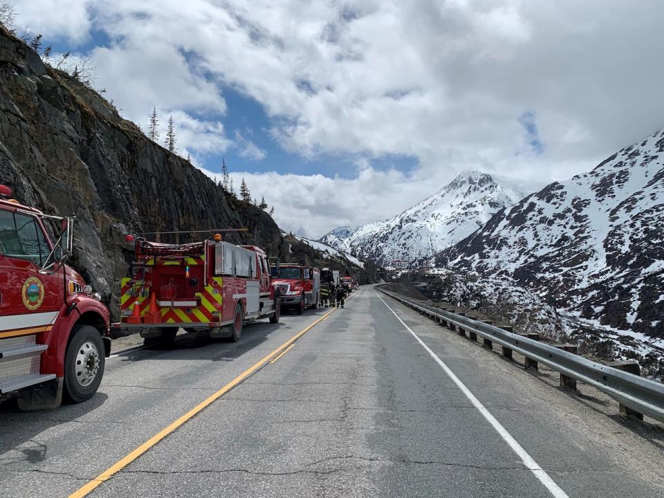 Firefighters respond to a vehicle fire on the Klondike Highway near Skagway, Alaska.