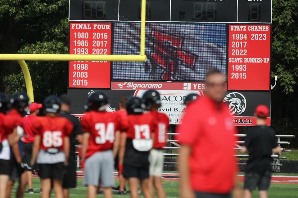 Last year's state championship is on the scoreboard with the rest of the team' accomplishments during East Central football practice August, 2024.