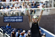 Kristina Mladenovic, of France, reacts after defeating Angelique Kerber, of Germany, during the first round of the U.S. Open tennis tournament Monday, Aug. 26, 2019, in New York. (AP Photo/Kevin Hagen)