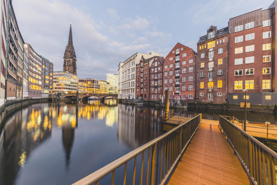 Germany, Hamburg, Nikolai Fleet and St. Nicholas' Church in the evening <i>(Photo: Getty)</i>