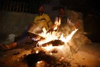 <p>Cold waves continue to hit interior at Geeta colony on December 12, 2017 in New Delhi, India. (Photo by Sonu Mehta/Hindustan Times via Getty Images) </p>