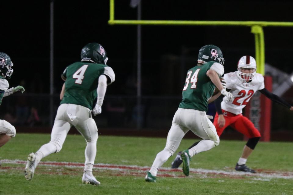 Oak Harbor's Tyler Thompson races to the end zone.