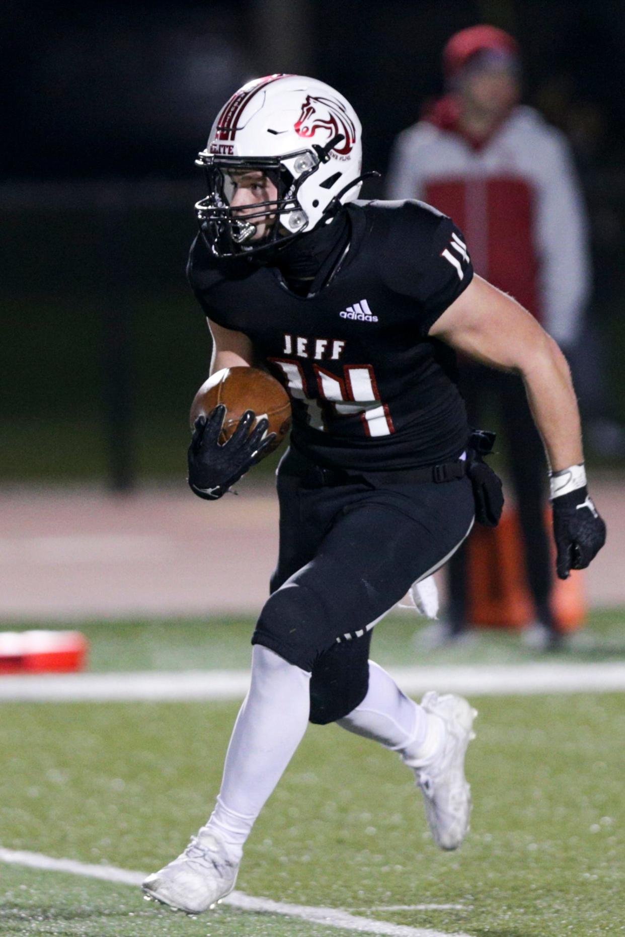 Lafayette Jeff's Steven Stephany (14) runs the ball during the second quarter of the IHSAA class 6a football sectional no. 1 sectional championship, Friday, Nov. 5, 2021 in Lafayette.