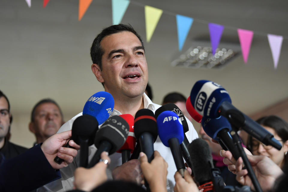 Leader of the main opposition Syriza party, Alexis Tsipras talks to the media after casts his vote at a polling station in Athens, Greece, Sunday, May 21, 2023. Polls have opened in Greece's parliamentary election, the first since the country's economy ceased to be subject to strict supervision and control by international lenders who had provided bailout funds during its nearly decade-long financial crisis. (AP Photo/Michael Varaklas)