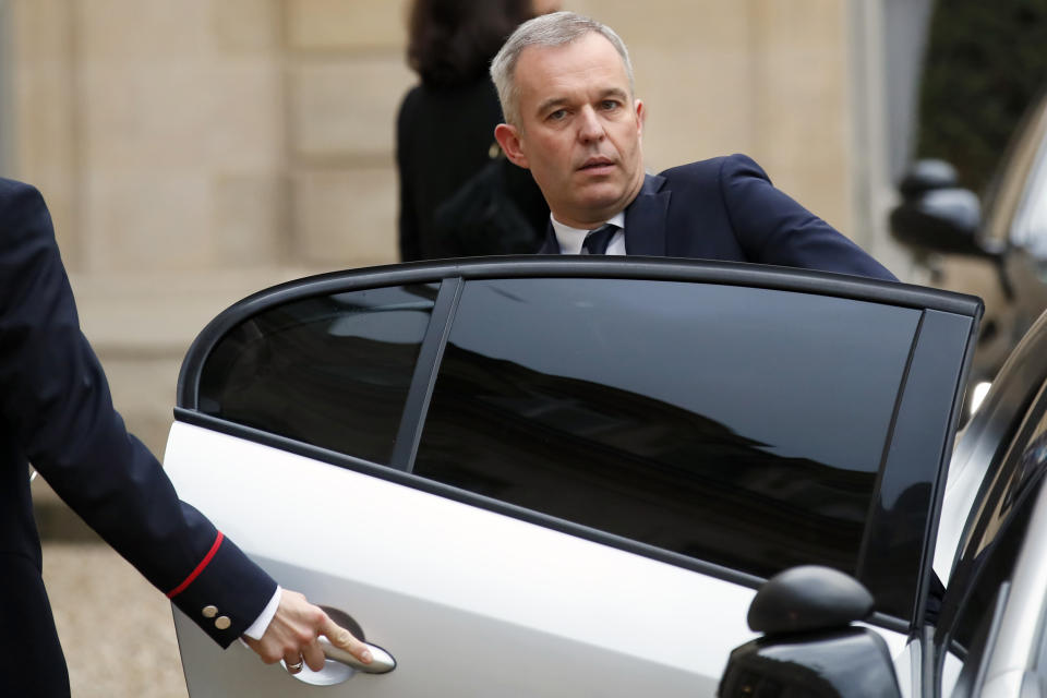 FILE - In this Dec.10, 2018 file photo, French Ecology Minister De Rugy enters his car after a meeting with French President Emmanuel Macron at the Elysee Palace in Paris. Francois de Rugy resigned Tuesday July 16, 2019 over reports of publicly funded lavish lifestyle. (AP Photo/Francois Mori, File)