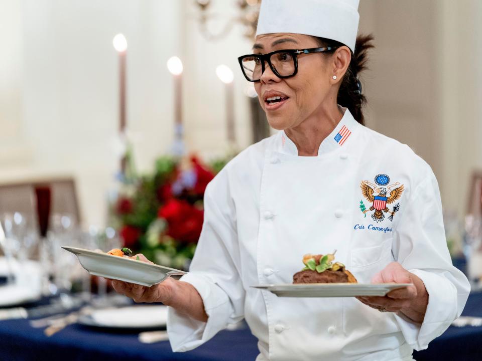 White House executive chef Cris Comerford presents the dishes that will be served during the state dinner to reporters.