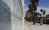 FILE PHOTO: Closed bars are seen on the Miquel Pellisa street known as "Ham street" in playa de Palma