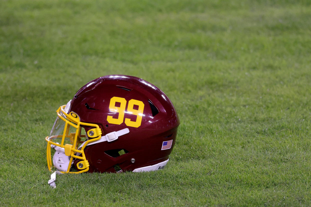 LANDOVER, MARYLAND - JANUARY 09: A detail of the helmet of Chase Young #99 of the Washington Football Team during warm ups before the start of the NFC Wild Card playoff game against the Tampa Bay Buccaneers at FedExField on January 09, 2021 in Landover, Maryland. (Photo by Rob Carr/Getty Images)