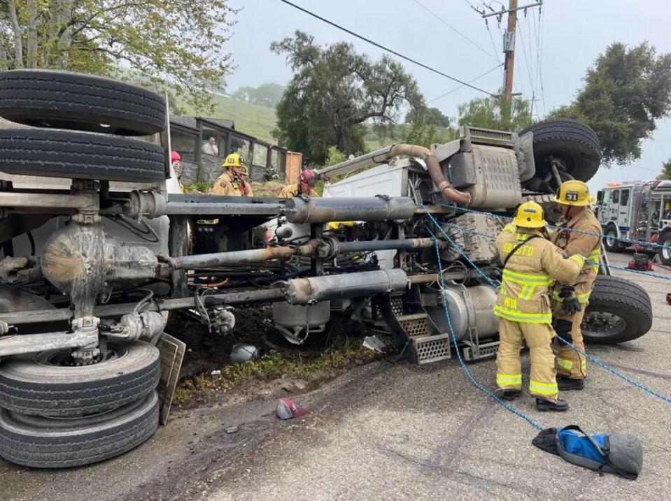 Heavy extrication was required to free the critically injured occupant of a cement mixer truck that overturned near Buellton on Wednesday, April 3, 2024.