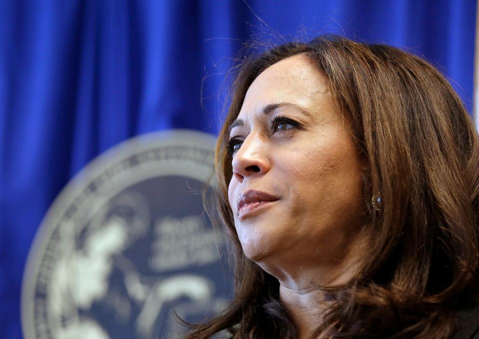 In this June 28, 2016 file photo California Attorney General Kamala Harris listens to questions during a news conference in San Francisco. President Barack Obama and Vice President Joe Biden on Tuesday, July 19, endorsed Harris to be the state's next U.S. senator.