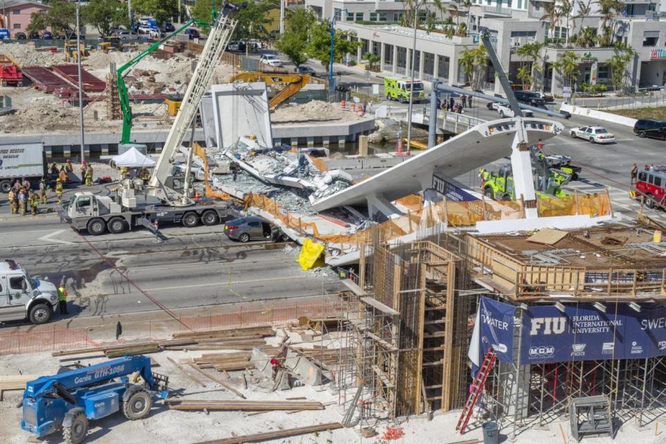 The bridge crushed several cars and killed at least four people (EPA)