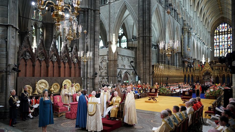 TOPSHOT - Britain's King Charles III holds the Sword of State during the Coronation Ceremony inside Westminster Abbey in central London on May 6, 2023. The set-piece coronation is the first in Britain in 70 years, and only the second in history to be televised. Charles will be the 40th reigning monarch to be crowned at the central London church since King William I in 1066. Outside the UK, he is also king of 14 other Commonwealth countries, including Australia, Canada and New Zealand. Camilla, his second wife, will be crowned queen alongside him and be known as Queen Camilla after the ceremony. (Photo by Jonathan Brady / POOL / AFP)