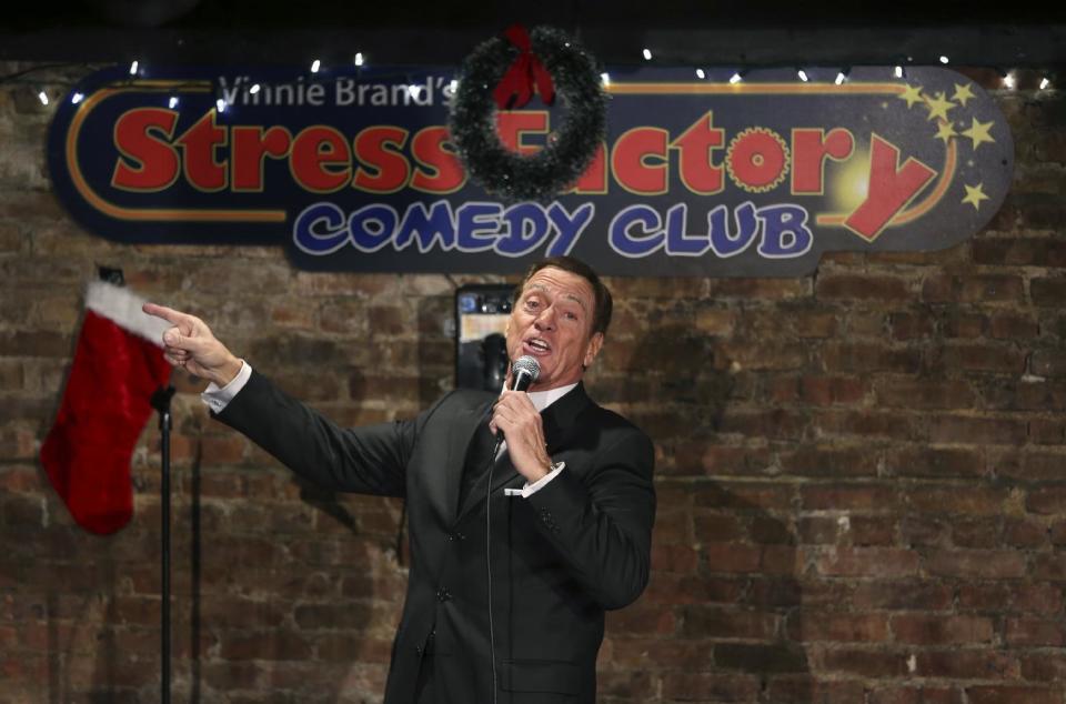 Joe Piscopo sings an updated "New York, New York,"as "New Jersey, New Jersey" during an event to help raise funds for the Boys and Girls Club of America at the Stress Factory Comedy Club Tuesday, Dec. 6, 2016, in New Brunswick, N.J. Famous for his SNL portrayal of Frank Sinatra, the actor, comedian and radio host is a potential candidate for governor in 2017 to succeed Republican Gov. Chris Christie.(AP Photo/Mel Evans)