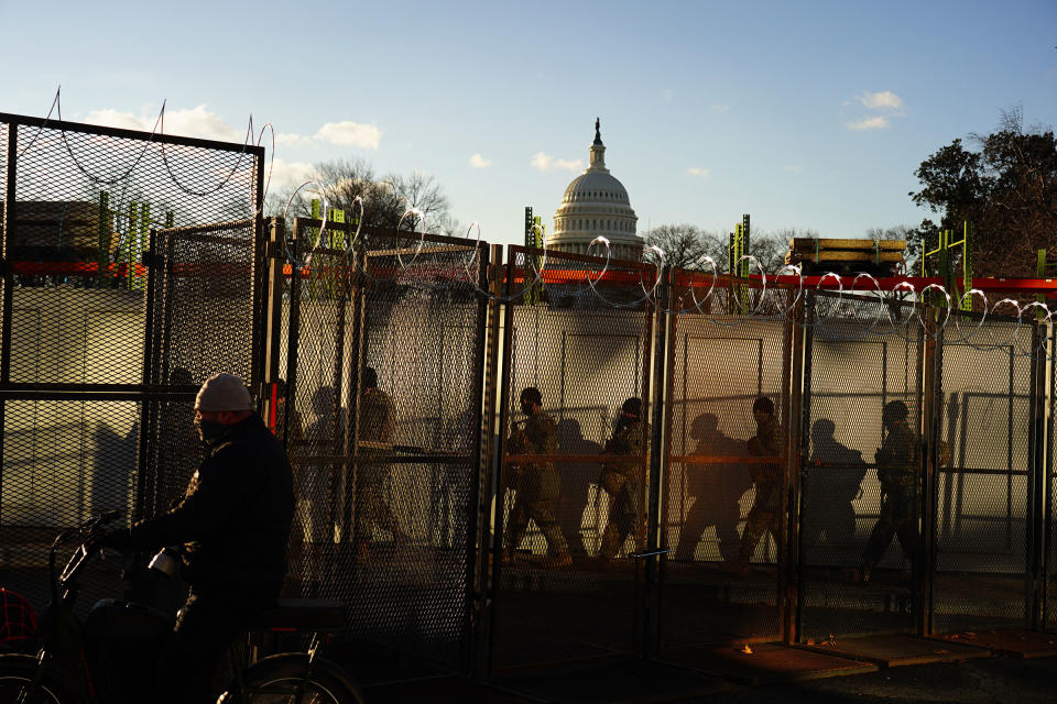 Security and fencing in front of the U.S. Capitol building prior to the start inauguration.<span class="copyright">Marcus Yam—Los Angeles Times/Polaris</span>
