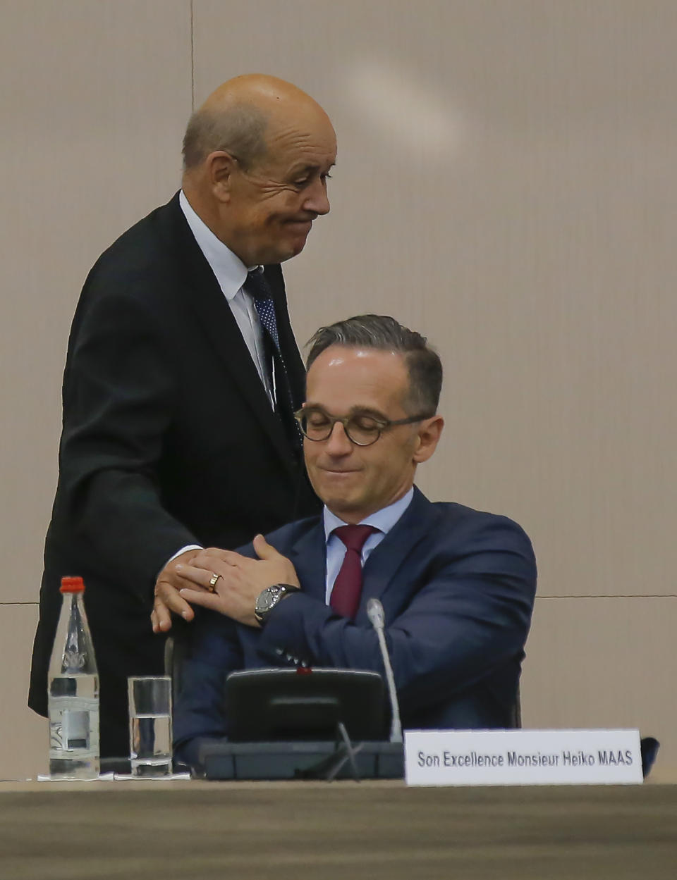 French Foreign Minister Jean-Yves Le Drian left, and German Foreign Minister Heiko Maas attend the opening session of the French ambassadors to European countries in Paris, Monday, Aug. 31, 2020. (AP Photo/Michel Euler)