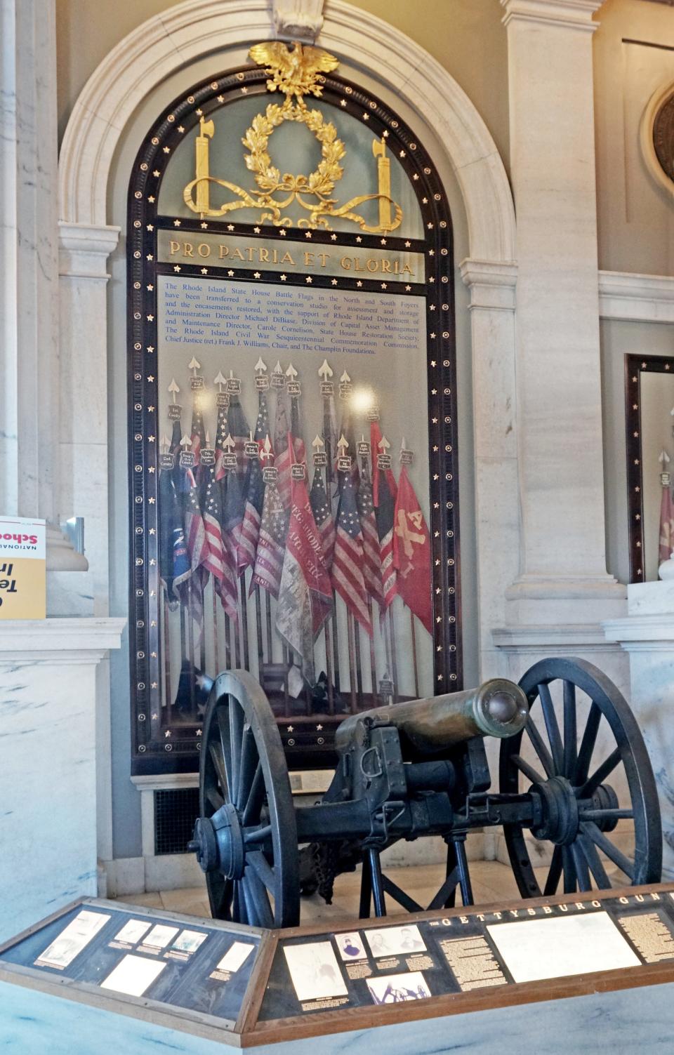 Historic Rhode Island battle flags at the State House from the Civil War, Spanish-American War and World War I, shown here
 in a 2018 photo, have been replaced by large prints of the flags. [Sandor Bodo/The Providence Journal, file]