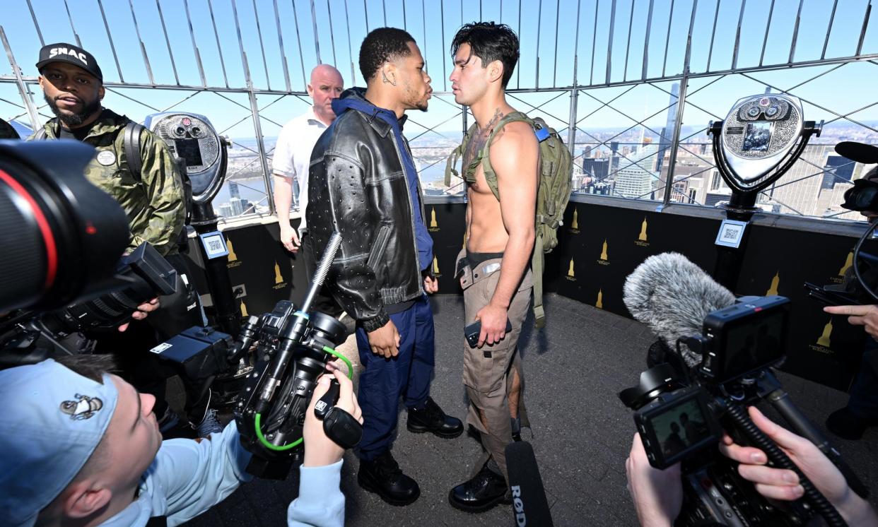 <span>Devin Haney and Ryan Garcia face off atop the Empire State Building on Tuesday ahead of their WBC super lightweight title fight. </span><span>Photograph: Roy Rochlin/Getty Images for Empire State Realty Trust</span>